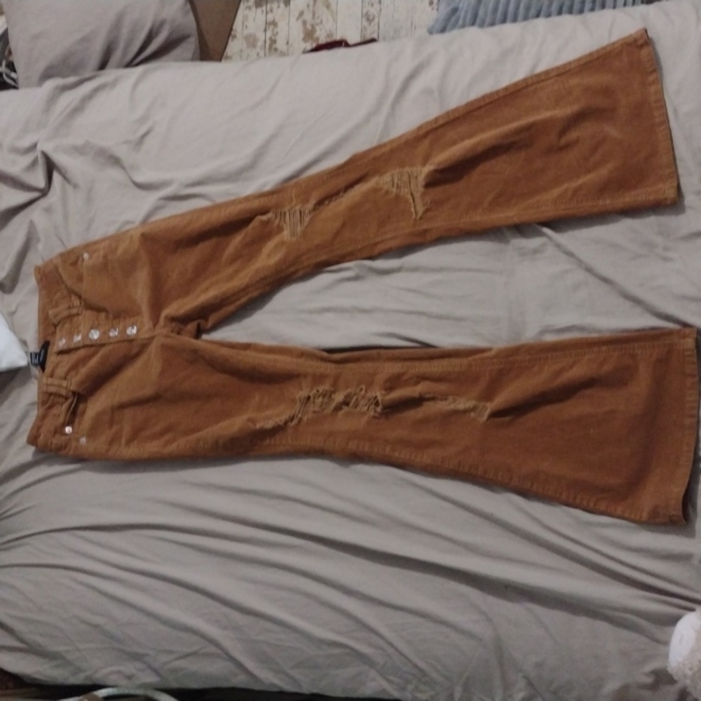 Ripped corduroy bell-bottoms
